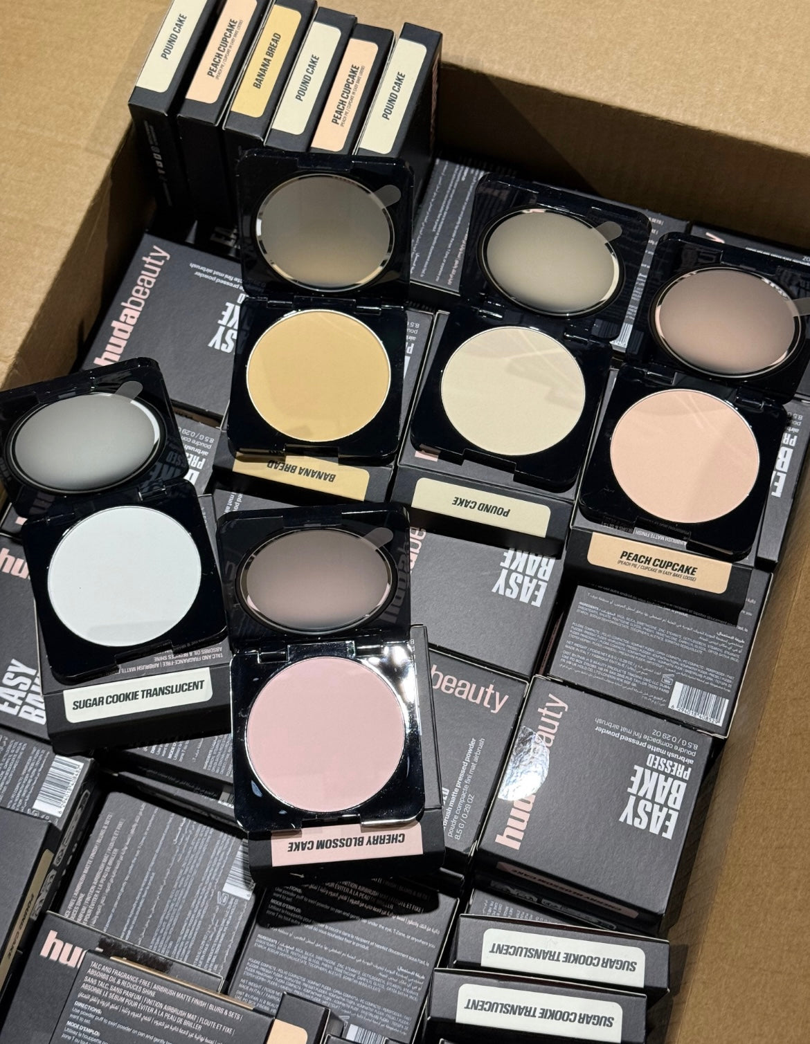 100x mix shades huda pressed powder